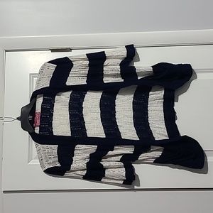 Woman's blue and white striped knitted sweater with pockets